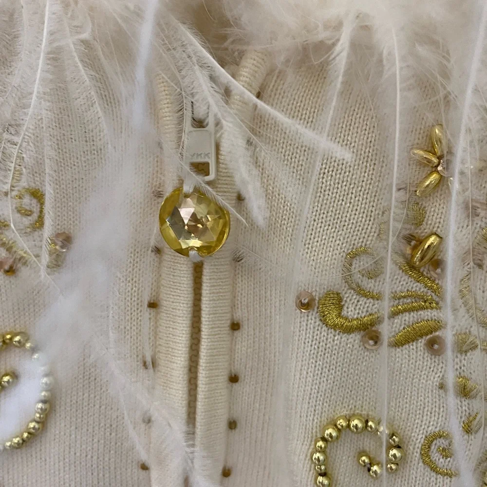Elegant Cream and Gold Christmas Holiday Women's Sweater with Feather Trim - Picture 9 of 17